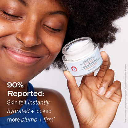 Model holding jar of Firming Cream.  90% Reported: Skin felt instantly hydrated + looked more plump + firm.