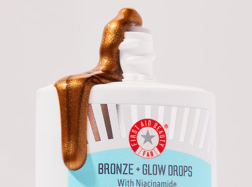 Bronze + Glow Drops shown with product/texture coming out of the bottle's nozzle.