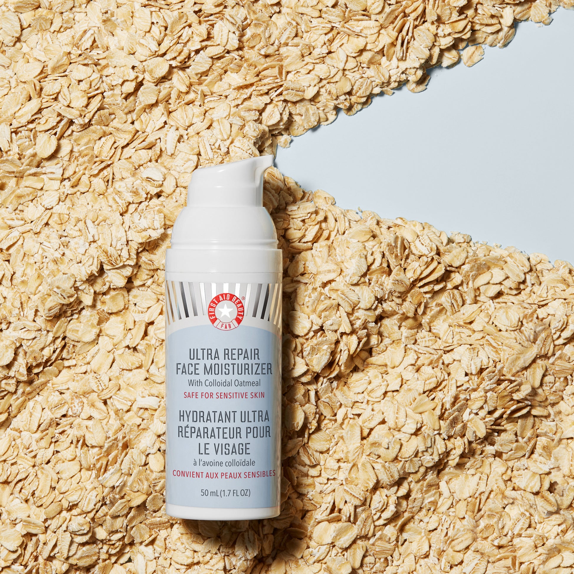 Ultra Repair Face Moisturizer on textured background of oats